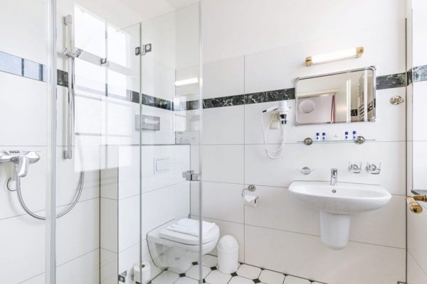 Standard double room en-suite with shower at Hotel Stranddistel in Goehren, Ruegen Island