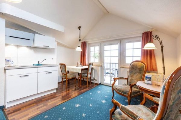 Book a suite with sea view and balcony at Hotel Stranddistel for your holiday in Goehren, Ruegen Island